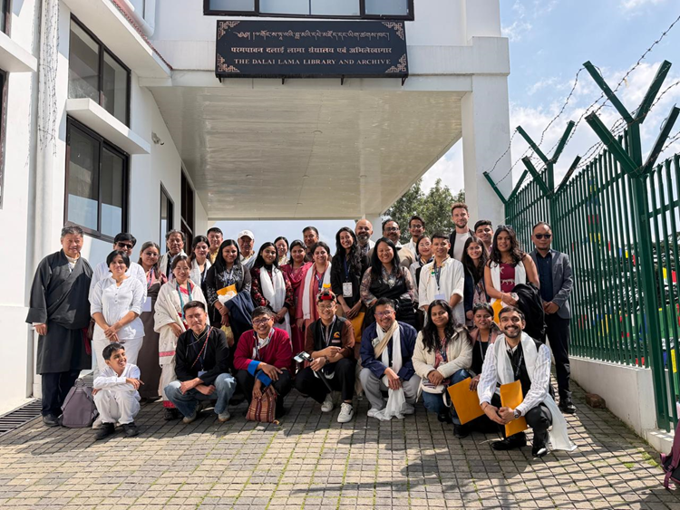 Participants outside the Dalai Lama Library and Archive during a visit.