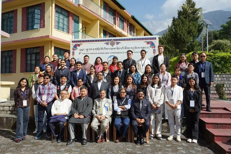 Participants and organisers with the conference banner, the Eighth Young Indian Scholars’ Conference on Tibetan Studies. (Lead image)